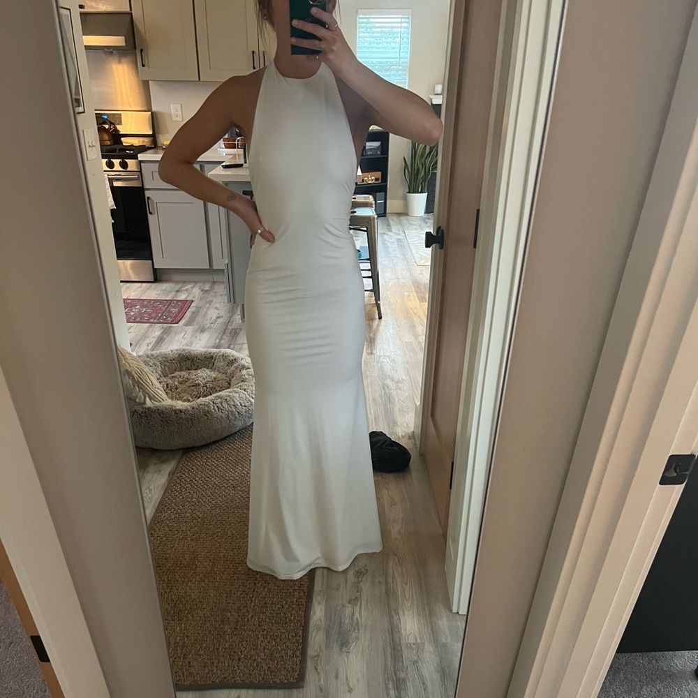 White floor length/backless dress. Brand is Lurelly, worn once 5 years ago.